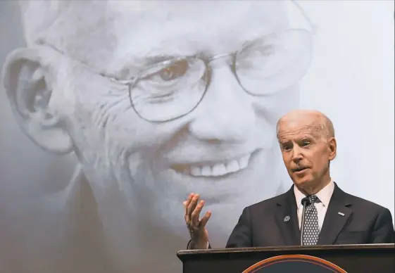  ??  ?? Former Vice President Joe Biden speaks Friday during “Slainte! Celebratin­g the Life and Legacy of Daniel M. Rooney” in the ballroom at the Duquesne University Union.