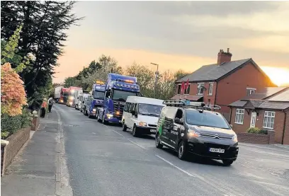  ??  ?? ● Tarleton & Hesketh Bank Community Convoy making its way through the streets in April