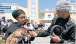  ?? Picture: FREDLIN ADRIAAN ?? ANIMAL CARE: Animal Anti-Cruelty League worker Faatimah Ajam holds three-month-old puppy Layla with manager Dylan Redcliff at Cleary Park Shopping Centre as part of an Internatio­nal Pitbull Awareness Day event on Saturday