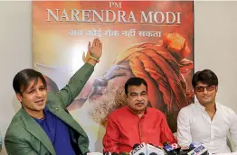  ?? — PTI ?? Actor Vivek Oberoi with Union minister and BJP leader Nitin Gadkari interact with the media during the poster launch of upcoming film PM Narendra Modi in Nagpur on Monday. Bollywood film producer Sandip Singh is also seen.