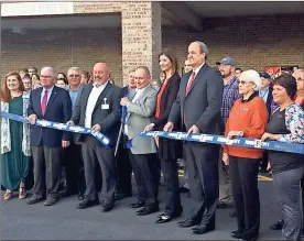  ?? / Joe Legge ?? Walker County, Rossville, and Food City officials cut the ribbon October 6 opening the new 38,000-square-foot grocery at 820 Mission Ridge Road.