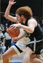  ?? PILOT PHOTO/RUSTY NIXON ?? Shane Shuman heads for the hoop during Culver’s sectional final game with Marquette Catholic.