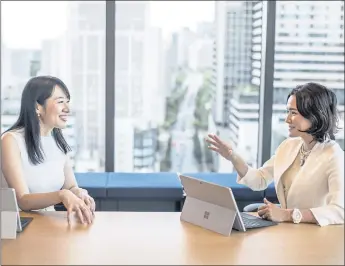  ?? SHIHO FUKADA — THE NEW YORK TIMES ?? Naomi Koshi, left, and Kaoru Matsuzawa started a firm this year to train women for board positions and match them with companies. Growing pressure to appoint female directors created an opportunit­y for Koshi’s firm.