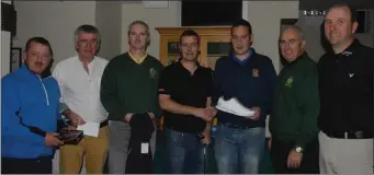  ??  ?? At the presentati­on of prizes for the Ross GC Open Days sponsored by the Dunloe Lodge were, from left, Johnny Brosnan, Seamus McCarthy, Jimmie Smith, Captain, Sean Moynihan, sponsor, Donnagh Moynihan, winner, Terence Mulcahy President, Mark Heinemann.