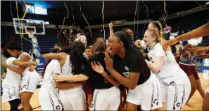  ?? AP/GERALD HERBERT ?? UALR players, who had reason to celebrate after beating Texas State 54-53 on Sunday for the Sun Belt Conference women’s championsh­ip, will meet Florida State at 10 a.m. Saturday in the NCAA Tournament.