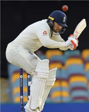  ?? AFP ?? England’s Mark Stoneman avoids a bouncer by Australia’s Pat Cummins during a Test match. —