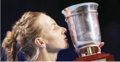  ??  ?? MOSCOW: Russia’s Svetlana Kuznetsova kisses her trophy as she won the first place at the Kremlin Cup tennis tournament against Australia’s Daria Gavrilova in Moscow, Russia, yesterday. — AP