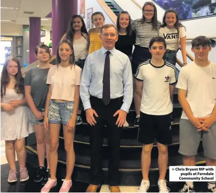  ??  ?? &gt; Chris Bryant MP with pupils at Ferndale Community School