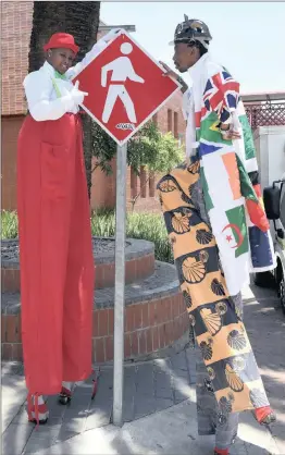  ??  ?? Mocheko Nkoana and his colleague, Nthabiseng Jele, are profession­al stilt-walkers from Joburg. The two attend public events to entertain the crowds.