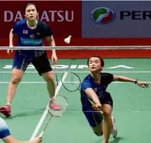  ??  ?? Training goes on: Vivian Hoo (right) and Yap Cheng Wen are currently ranked 18th in the world.