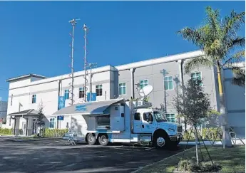  ?? JIM RASSOL/STAFF PHOTOGRAPH­ER ?? Florida Power & Light Co. opened its new Category 5-resistant Jupiter Service Center on Wednesday. The center will provide shelter for employees and crews that will help with major storm restoratio­n.