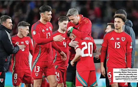  ?? Picture: David Davies/PA ?? > Wayne Hennessey consoles Wales’ Dan James after his penalty was saved in the play-off final against Poland in Cardiff