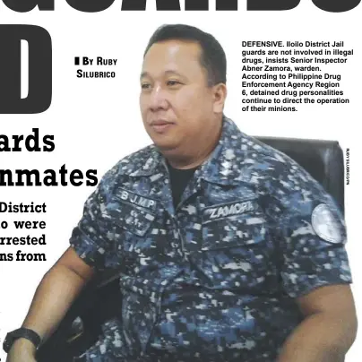  ??  ?? DEFENSIVE. Iloilo District Jail guards are not involved in illegal drugs, insists Senior Inspector Abner Zamora, warden. According to Philippine Drug Enforcemen­t Agency Region 6, detained drug personalit­ies continue to direct the operation of their...