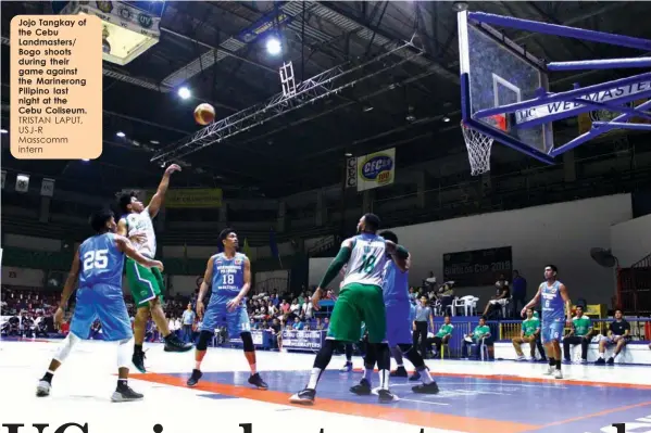  ?? TRISTAN LAPUT, USJ-R Masscomm intern ?? Jojo Tangkay of the Cebu Landmaster­s/ Bogo shoots during their game against the Marinerong Pilipino last night at the Cebu Coliseum.