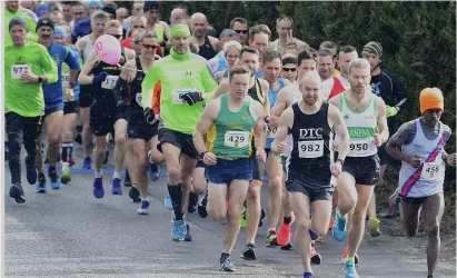  ??  ?? Race winner Hiko Tonasa (DSD) leads the field away in the Ayrton Group Duhallow 10-mile Road Race in Newmarket. Photo by John Tarrant