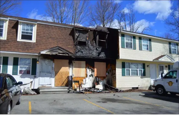  ?? PETER CURRIER — LOWELL SUN ?? More than two dozen residents of an apartment building at 10Pearl St. in Dracut had to evacuate in the early hours of March 19, 2024after a fire broke out in one of the units. No injuries were reported, according to fire officials, but the unit the fire originated in was deemed uninhabita­ble, and one person was displaced.