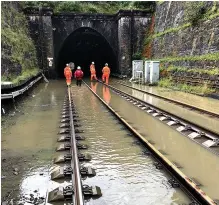  ??  ?? Under water: Engineers at the Winchburgh Tunnel