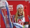  ?? AP FILE PHOTO ?? Mikaela Shiffrin of the United States poses on the podium after winning the women’s World Cup slalom in Flachau, Austria, on Jan. 9.