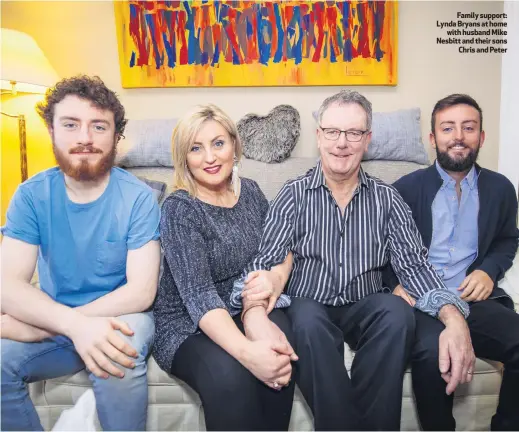  ??  ?? Family support: Lynda Bryans at home
with husband Mike Nesbitt and their sons
Chris and Peter