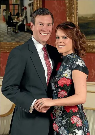  ?? PHOTO: GETTY IMAGES ?? Princess Eugenie and Jack Brooksbank pose in the Picture Gallery at Buckingham Palace after they announced their engagement.