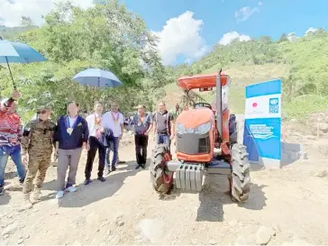  ?? PHOTOGRAPH COURTESY OF JAPAN EMBASSY ?? FARM tractor is among community assets handed by Japanese representa­tives to Bangsamoro officials in Isulan, Sultan Kudarat and Datu Mantil, Pigcawayan, Cotabato on 21 February.