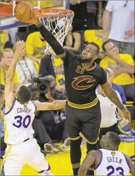  ?? AP photo ?? LeBron James gets a big block over Steph Curry on June 19.