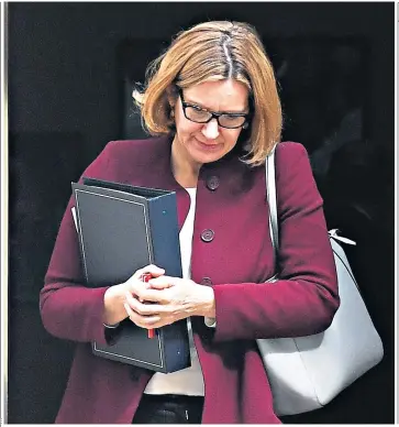  ??  ?? The former home secretary leaving Downing Street after a Cabinet meeting. Previously a minister under David Cameron, she took charge of the Home Office after he left office