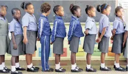  ?? PICTURE: ARMAND HOUGH ?? EAGER TO LEARN: Highlands Primary Schools pupils line up for their first year. About 3 500 are unplaced due to late applicatio­ns.