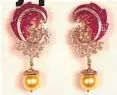  ??  ?? Kundan antique necklace (top) Ruby diamond earrings (right)