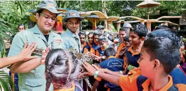  ??  ?? Students from four Perak schools celebrated Deepavali with an educationa­l tour at the Lost World of Tambun.