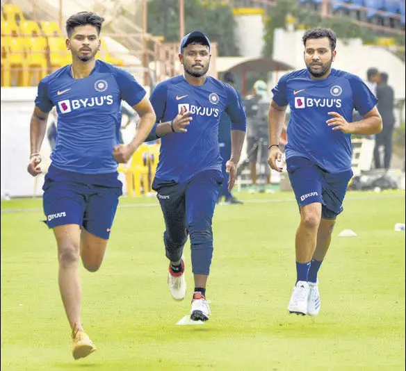  ?? PTI ?? India captain Rohit Sharma (R) with teammates Shreyas Iyer (L) and Sanju Samson during a practice session ahead of the second T20 match against Bangladesh in Rajkot. The hosts lost the first game of the three-match series by seven wickets.