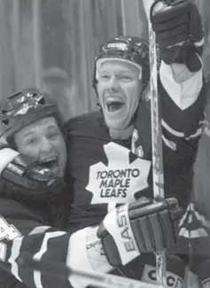  ?? FRANK GUNN/THE CANADIAN PRESS ?? Mats Sundin is embraced by Leafs teammate Bryan Mccabe after scoring his 500th career goal — which also won the game in OT — on Oct. 14, 2006.