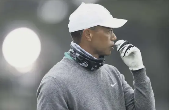  ??  ?? 2 Tiger Woods looks pensive as he studies a shot during yesterday’s practice round ahead of this week’s US PGA Championsh­ip in San Francisco.