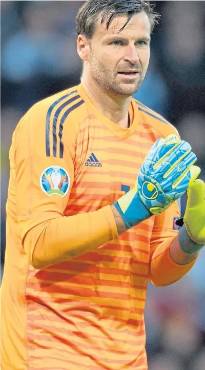  ??  ?? David Marshall will be doing everything he can to stop Israel’s Eran Zahavi (inset) scoring tonight