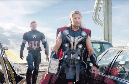  ?? Jay Maidment Marvel ?? CAPTAIN AMERICA (Chris Evans) and Thor (Chris Hemsworth) confront not just the deadly Ultron but sky-high expectatio­ns after the first “Avengers.”