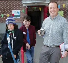  ??  ?? Jonathan Browner, Principal of North Wicklow Educate Together Secondary School, with Setanta Ballesty and Fionn Power.