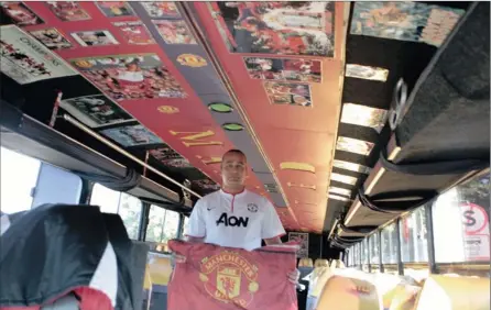  ?? PICTURES: PURI DEVJEE ?? GLORY GLORY, BUS UNITED: The interior of the bus is emblazoned with Manchester United parapherna­lia.