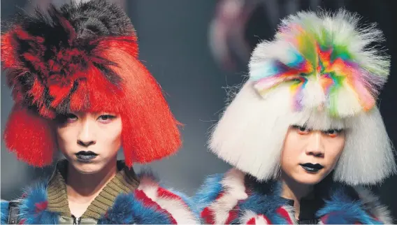  ?? Picture: EPA-EFE ?? Models present creations from the Autumn/Winter 2018 collection by Chinese-born designer Viviano Sue for the label ‘Viviano Sue’ during the Tokyo Fashion Week in Tokyo, Japan, yesterday.