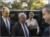  ?? DAVE SANDERS — THE NEW YORK TIMES ?? Sen. Robert Menendez and his wife, Nadine Menendez, arrive for their arraignmen­t in New York Sept. 27.