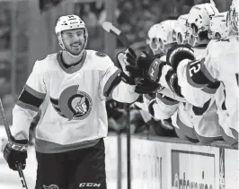  ?? TIMOTHY T. LUDWIG/USA TODAY SPORTS ?? Ottawa Senators left wing Boris Katchouk, left, celebrates his first-period goal against the Sabres on Wednesday in Buffalo, N.Y.