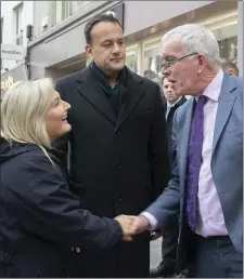  ??  ?? Verona Murphy talking to Liam Riordan as she campaigned in Wexford town yesterday (Monday) with An Taoiseach Leo Varadkar.