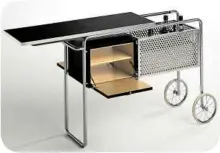  ??  ?? A bar cart can play multiple roles and is one of the most flexible small kitchen furniture pieces one can have.
