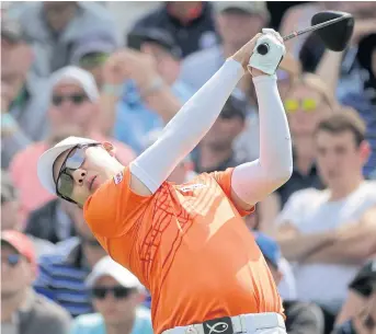  ??  ?? Jazz Janewattan­anond hits a shot at the PGA Championsh­ip in May.