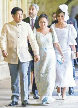  ?? ?? President Bongbong Marcos and First Lady Liza Araneta Marcos in London: The British press gave a nod to how Liza was dressed during the coronation of King Charles. Cabral put embroidery on piña calado in powder blue.