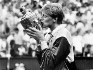  ?? THE HINDU PHOTO
LIBRARY ?? Another era: Boris Becker with his Wimbledon crown in 1986. This was one of three Wimbledon titles he won in his career. The switch to 100 percent perennial grass in 2002 has slowed the courts at Wimbledon so much that Becker once admitted, “I could have never won a single Wimbledon on such ‘slow’ surfaces.”