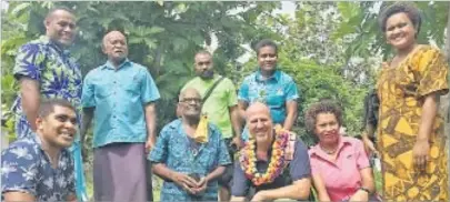  ?? Picture: MELI LADDPETER ?? President and founder of the Pacific Blue Foundation (with garland), poses for a picture with villagers from Yanuca, his team and officers from the Ministry of Forestry after the launch of their tree
planting program.