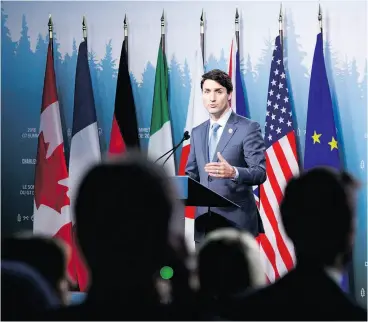  ?? SEAN KILPATRICK / THE CANADIAN PRESS ?? Prime Minister Justin Trudeau holds a press conference Saturday at the G7 Leaders Summit, where according to one reader he was “Trumped.”