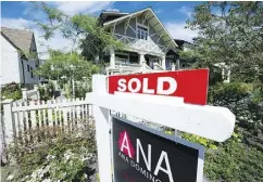  ?? MARK VAN MANEN / POSTMEDIA NEWS FILES ?? West side houses and condos for sale in Vancouver.