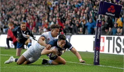  ?? PHOTO: GETTY IMAGES ?? Sean Maitland scores for Scotland in an absorbing Six Nations win over England at Murrayfiel­d.