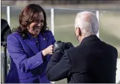  ?? JONATHAN ERNST — POOL PHOTO ?? Vice President Kamala Harris bumps fists with President Joe Biden after she was sworn in during the inaugurati­on Wednesday at the U.S. Capitol in Washington.